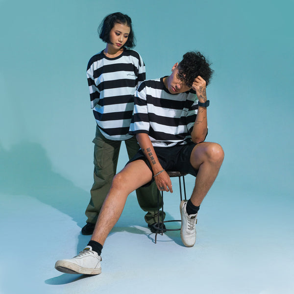 Model wearing Stripe Oversize tee, Singapore streetwear brand