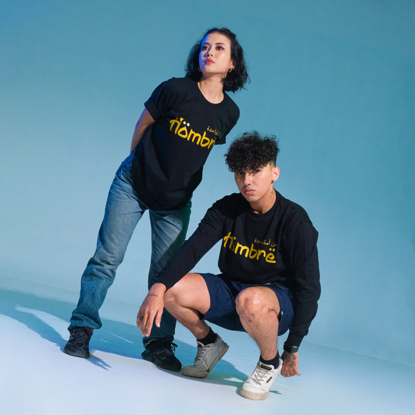 Model wearing Black Gold Series Arabic calligraphy tee, Singapore streetwear