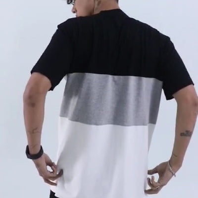 Model wearing Monochrome Black oversized tee, Singapore streetwear brand