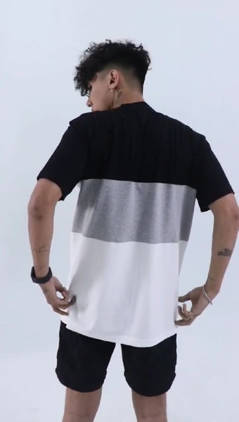 Model wearing Monochrome Black oversized tee, Singapore streetwear brand
