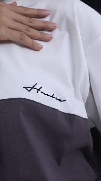 Monochrome White tee fabric close-up, premium cotton