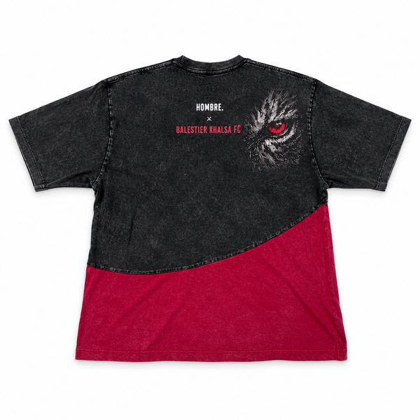Back of HOMBRE x Balestier Khalsa FC Tiger Fury oversized washed tee, with red tiger-eye artwork, collaboration branding and deep red lower panel