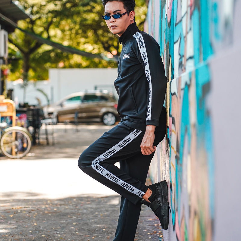 Model wearing HOMBRE TRACKSUIT JACKET (TOP ONLY), Singapore streetwear brand